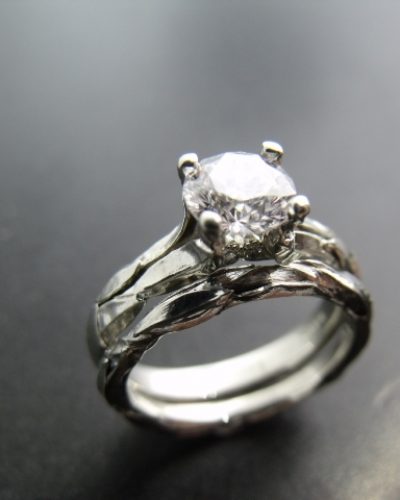 Claw set diamond engagement ring with leaf and vine motif. By Marcus Ó Broin Jewellery, Kelowna, BC