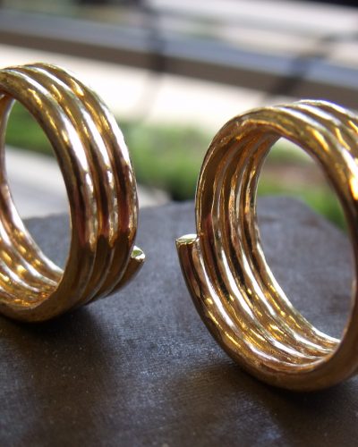 Two matching yellow gold rings made from coiled gold wire. By Marcus Ó Broin Jewellery, Kelowna, BC