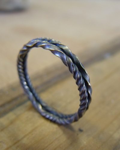 Sterling silver ring with patina made from two separate bands twisted. By Marcus Ó Broin Jewellery, Kelowna, BC.