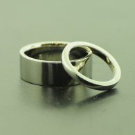 White gold polished man's wedding and ladies wedding band. By Marcus Ó Broin Jewellery, Kelowna, BC