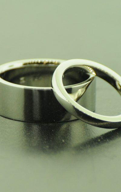 White gold polished man's wedding and ladies wedding band. By Marcus Ó Broin Jewellery, Kelowna, BC